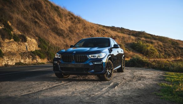This is a BMW X6 (G06 generation). Key identifiers: SUV coupe body style (sloping rear roofline) High ride height and wide stance Large, aggressive BMW kidney grille M Sport–style front bumper with large side intakes Proportions larger and taller than a sedan This is clearly an X Series SUV, specifically the X6, which is BMW’s mid-size luxury SUV coupe. Type: Mid-size luxury SUV (SUV coupe).